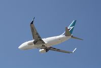 C-GQWJ @ KSNA - Boeing 737-700 - by Mark Pasqualino