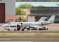 N77OSC @ AUA - Loading of passengers on the platform of Reina Beatrix Airport - by Willem Göebel
