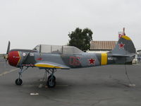 N152YK @ SZP - 1995 Yakovlev YAK 52, Vedeneev (Ivchenko) M-14P 360 Hp, military two-place tandem seat trainer, semi-retractable tri-gear, pneumatic pressurized accumulator air system for engine start & gear. Experimental class. - by Doug Robertson