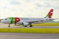 CS-TMW @ EPWA - Airbus A320-214 - by Jerzy Maciaszek