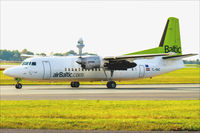 YL-BAC @ EPWA - Fokker 50, - by Jerzy Maciaszek