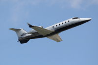 N600PH @ KSRQ - Learjet 60 (N600PH) departs Sarasota-Bradenton International Airport enroute to Teterboro Airport - by jwdonten