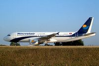 TS-INI @ LFPG - Airbus A320-211 [301] (Nouvelair Tunisie) Paris-Charles De Gaulle~F 24/07/2004 - by Ray Barber