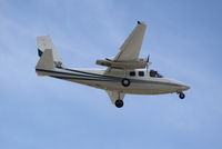N121SP @ KSRQ - Aero Commander 500 (N121SP) on approach to Sarasota-Bradenton International Airport following a flight from Naples Municipal Airport - by jwdonten