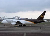 N352UP @ KEWR - This aircraft was less than three months old when I took this picture.  She is making her way for take-off under a brooding sky.  Visible in the background is the Bayonne Bridge. - by Daniel L. Berek
