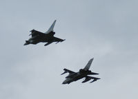 ZA549 @ EGQL - a 15(R)Sqn Tornado GR.4T ZA549 In formation with a 6sqn Typhoon FGR.4 ZK317 After the airfield attack demo at Leuchars airshow 2011 - by Mike stanners