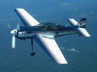 N329SU - N329SU returning from an aerobatic contest in Louisiana - by Lynne Stoltenberg