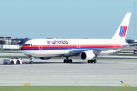 N651UA @ KORD - Oct. 1992 - pushing back