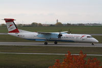 OE-LGK @ LOWW - Austrian Arrows DHC-8 - by Thomas Ranner