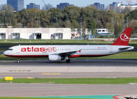 TC-ETM @ AMS - Taxi to runway 09 of Schiphol Airport - by Willem Göebel