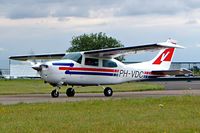 PH-VDC @ EGBP - R/Cessna FT.210M Turbo Centurion [210-62368] Kemble~G 11/07/2004. Taxiing for departure.