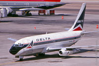 N369DL @ KPHX - Feb. 1999 - taxiing in at PHX - by John Meneely