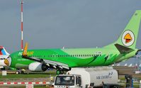 TC-AAK @ EGSH - In a crowded place, recently out of spray in it's new NokAir colour scheme ! - by keithnewsome