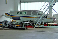 N7314U @ EDLW - Cessna 411 [411-0014] Dortmund~D 26/05/2006. Tucked away at the back of the hangar with markings removed. - by Ray Barber