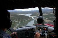 CF-FHZ @ CEZ5 - On approach to Lake Schwatka at Whitehorse, Yukon after a flightseeing tour. Shot at 10:18pm on June 21st, the longest day of the year. - by Murray Lundberg