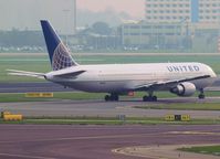 N656UA @ AMS - Taxi to runway 24 of Schiphol Airport - by Willem Göebel