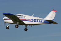 G-AYKW @ EGBR - Piper PA-28-140 Cherokee. Hibernation Fly-In, The Real Aeroplane Club, Breighton Airfield, October 2012. - by Malcolm Clarke