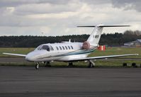 M-WMWM @ EGHH - Awaiting attention at Citation Centre - by John Coates