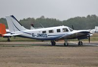 G-JMOS @ EGHH - Outside its home at Airtime - by John Coates
