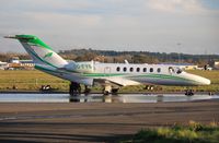 OO-FYS @ EGHH - Forest Wings Citation parked by the lake at Signatures. - by John Coates