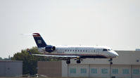 N242JS @ KCLT - Landing CLT - by Ronald Barker
