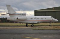 M-FALC @ EGHH - Parked at Jetworks - by John Coates