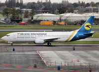 UR-GAX @ EHAM - Taxi to the gate of Schiphol Airport - by Willem Göebel