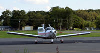 N8777W @ KOMH - Orange - by Ronald Barker