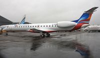 G-EMBW @ EGHH - Freshly painted for NovoAir, Bangladesh at Airbourne Colours. - by John Coates