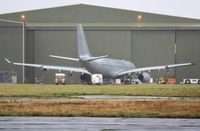 EC-331 @ EGHH - Now in RAF grey...carrying pre-delivery reg. MRTT-018.  Due to be ZZ331 for RAF.  
First time outside since return from Manchester paintshop. - by John Coates