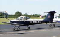 G-BGXO @ EGTB - Ex: N9703N > G-BGXO - Originally owned to, Air Navigation & Trading Co Ltd in July 1979 and currently with, Goodwood Road Racing Co Ltd since September 1997. De-registered and Permanently withdrawn from use in February 2011. - by Clive Glaister