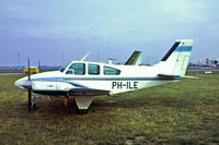 PH-ILE @ EHAM - Beech 95-A55 Baron [TC-220] Schiphol~PH 29/08/1976. Image taken from a slide.