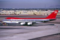 N601US @ KPHX - March 1999 - pushing back at PHX - by John Meneely