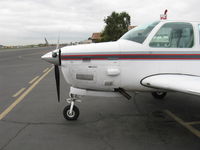 N8167K @ SZP - 1993 Beech B36TC TURBO BONANZA, Continental TSIO-520-UB 300 Hp continuous, big turbo exhaust - by Doug Robertson
