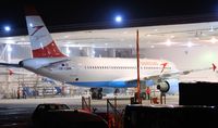 OE-LBW @ EGSH - About to be pushed out of sprayshop, with vehicle barrier in shot !! - by keithnewsome