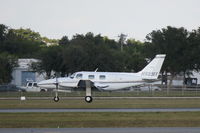 N9231Y @ KSRQ - Piper Navajo (N9231Y) arrives at Sarasota-Bradenton International Airport following a flight from Orlando Executive Airport - by jwdonten