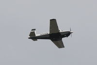 N2210W @ KSRQ - Mooney M-20 (N2210W) departs Sarasota-Bradenton International Airport enroute to Witham Field - by jwdonten