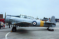 G-BGOV @ EGDY - North American AT-6C Harvard IIa [88-12044] Yeovilton~G 31/07/1982 image taken from a slide. wears former military marks of FX291. - by Ray Barber