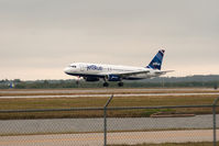 N807JB @ RSW - Landing RWY 6 on a cloudy day