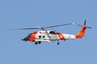 6009 @ KSRQ - USCG Clearwater 6009 performs training manuevers at Sarasota-Bradenton International Airport - by Jim Donten