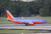 N254WN @ KTPA - Southwest Flight 450 (N254WN) arrives at Tampa International Airport following a flight from Bradley International Airport - by Jim Donten