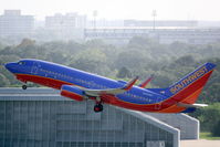 N458WN @ KTPA - Southwest Flight 3310 (N458WN) departs Tampa International Airport enroute to Green State Airport - by Jim Donten
