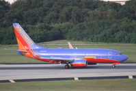 N477WN @ KTPA - Southwest Flight 2003 (N477WN) arrives at Tampa International Airport following a flight from Raliegh-Durham International Airport - by Jim Donten