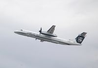 N415QX @ KLAX - DHC-8-400 - by Mark Pasqualino