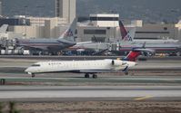N613QX @ KLAX - CL-600-2C10