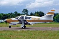N114ED @ EGBP - Rockwell Commander 114B [14637] Kemble~G 11/07/2004. Taxiing for departure. - by Ray Barber