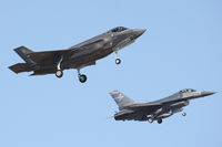 10-5011 @ NFW - Lockheed F-35A landing at NAS Fort Worth with company F-16 chase.