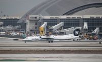 N420QX @ KLAX - DHC-8-400 - by Mark Pasqualino