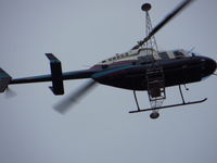 N619 - Saw this flying over my house and heard from another photographer that the booms were part of a laser mapping system for the railroad. - by Tiffani Caudill