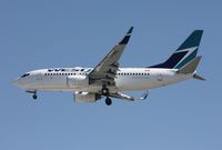 C-FWSX @ TPA - West Jet 737 - by Florida Metal